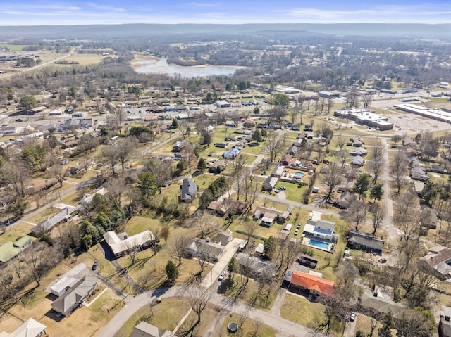 bird's eye view featuring a water view and a residential view