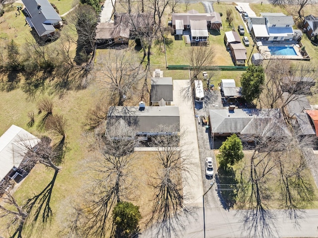 birds eye view of property with a residential view