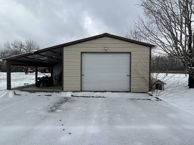 view of snow covered garage