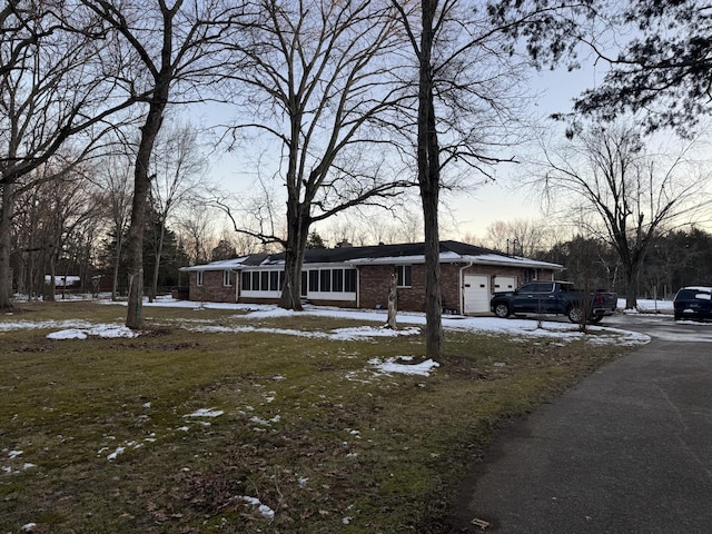 single story home featuring a garage