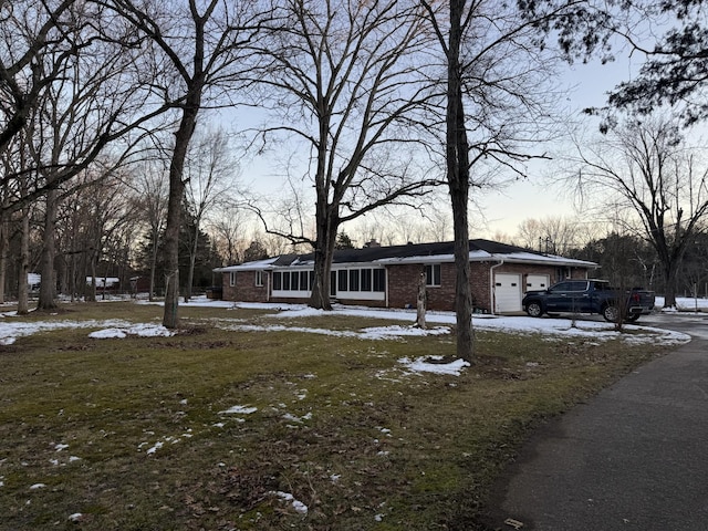 single story home featuring a garage