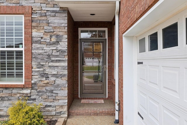 property entrance featuring a garage