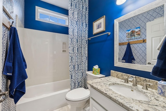 full bathroom with shower / bath combo with shower curtain, vanity, and toilet