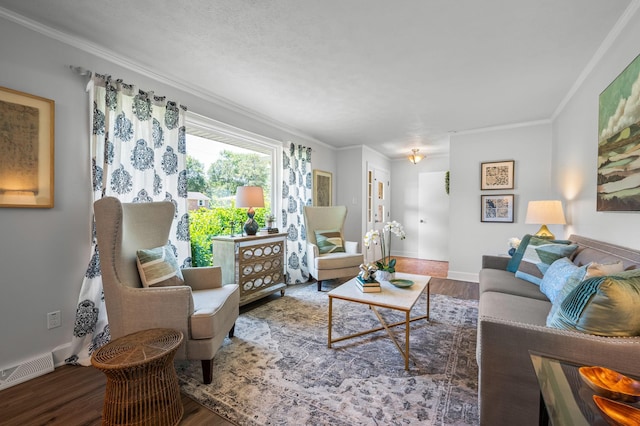 living room with hardwood / wood-style floors and crown molding