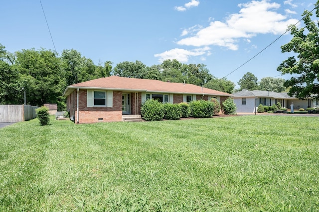 single story home with a front yard