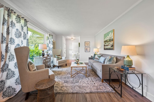 living room with ornamental molding and hardwood / wood-style flooring