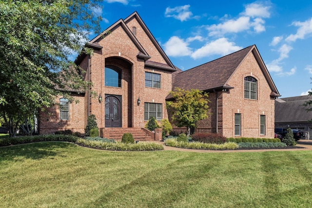 view of front of home with a front yard