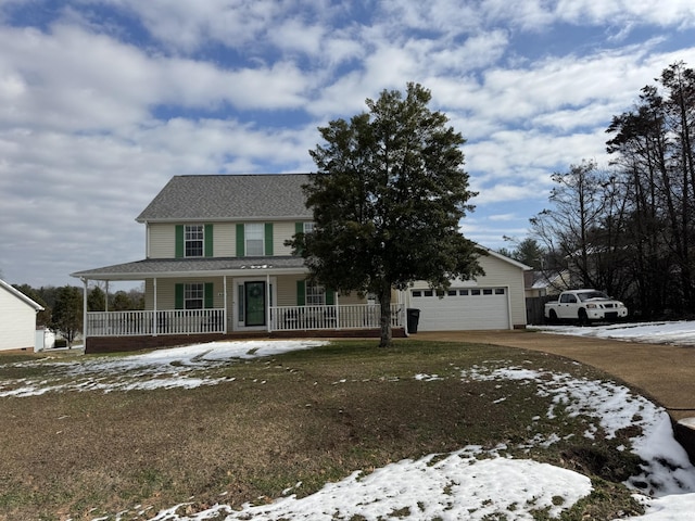 view of front of house featuring covered porch and a garage