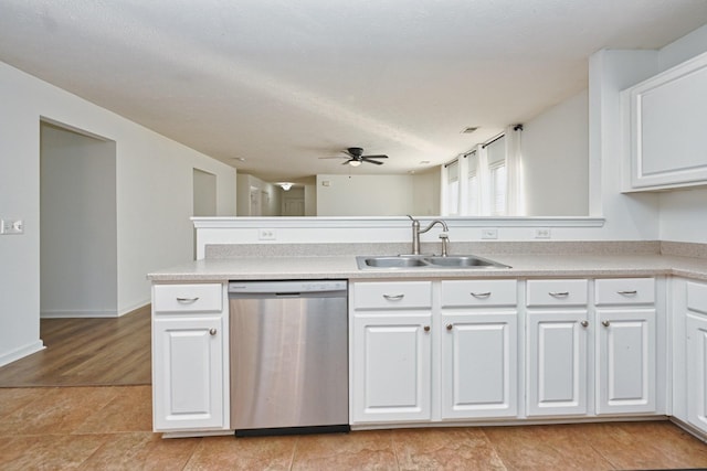 kitchen featuring dishwasher, white cabinets, sink, ceiling fan, and kitchen peninsula