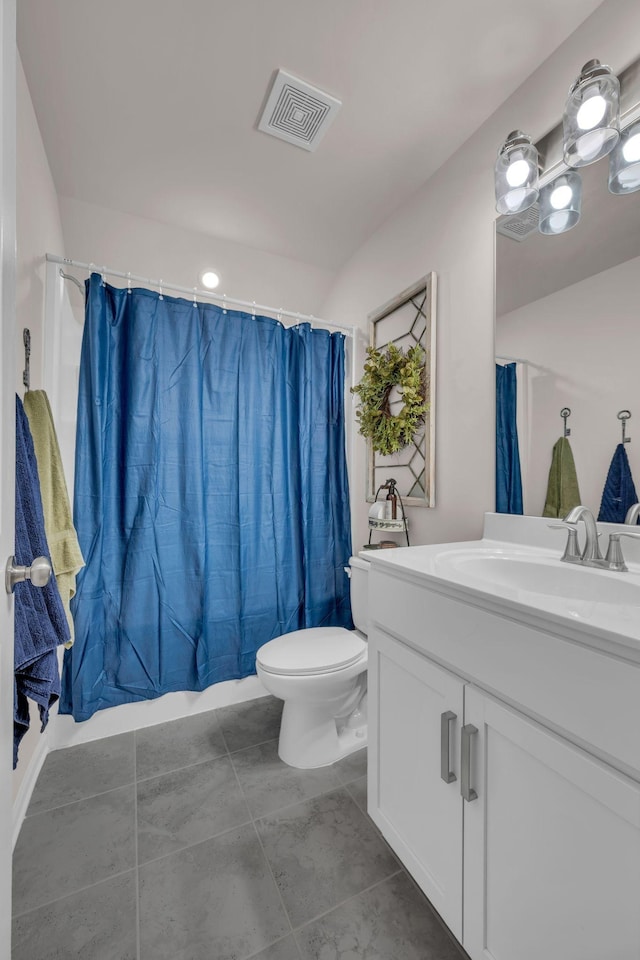 full bathroom with tile patterned flooring, vanity, toilet, and shower / tub combo with curtain