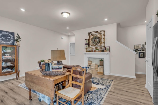 living room featuring light wood-type flooring