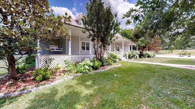 view of front of house featuring covered porch and a front lawn