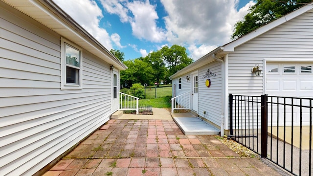 view of patio with a garage