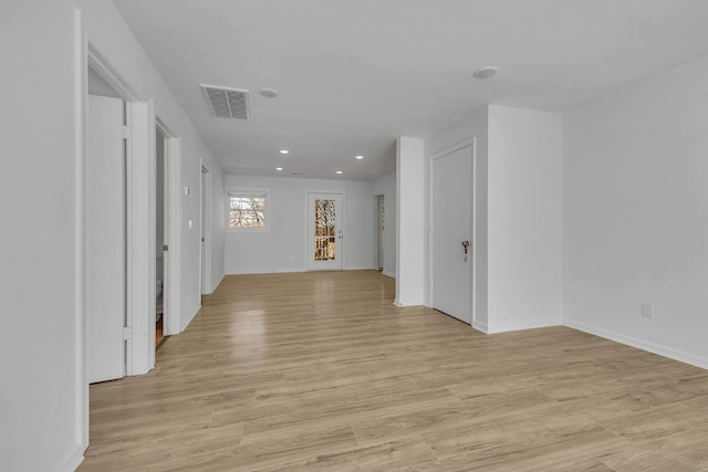 unfurnished room featuring light hardwood / wood-style flooring