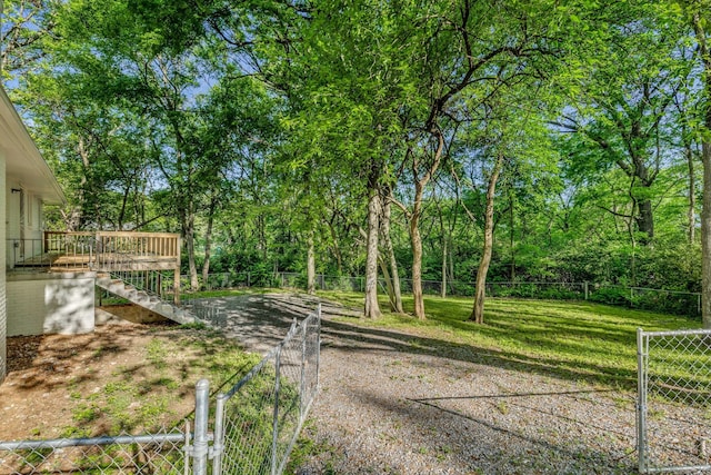 view of yard with a wooden deck