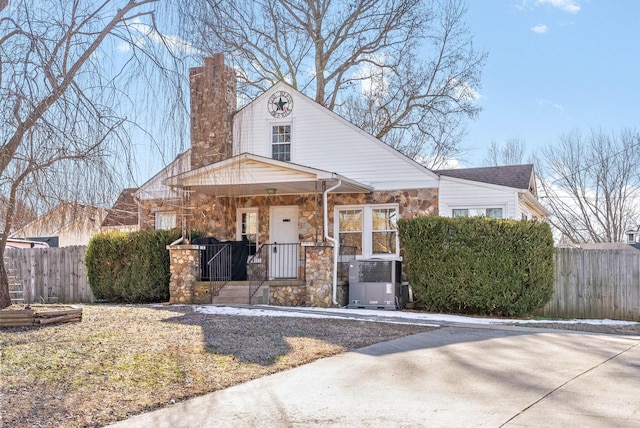 view of front of home featuring covered porch and central AC unit