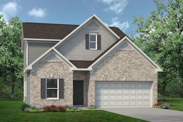 view of front of house with a front lawn and a garage