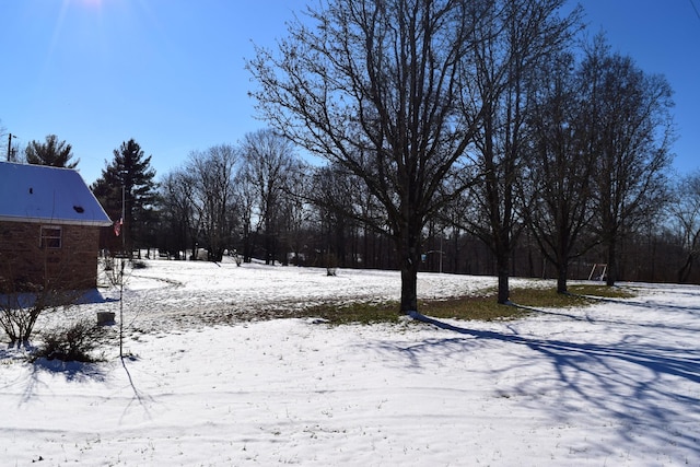 view of snowy yard