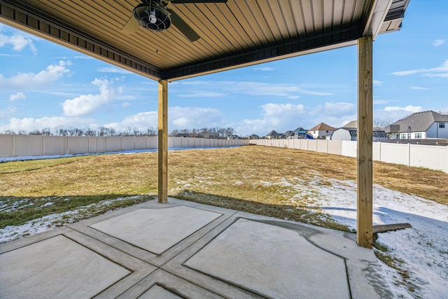 view of patio featuring ceiling fan