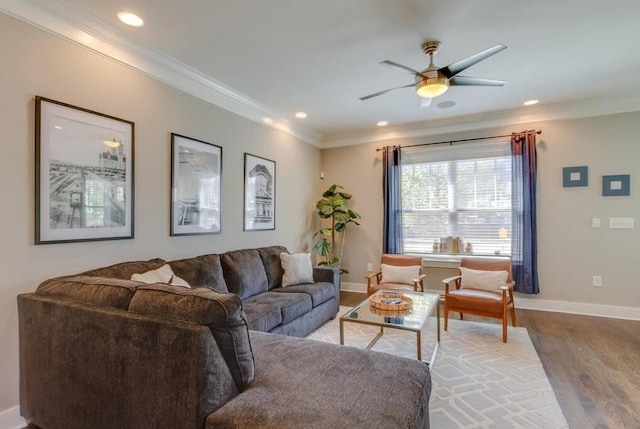 living room featuring crown molding, ceiling fan, and hardwood / wood-style flooring