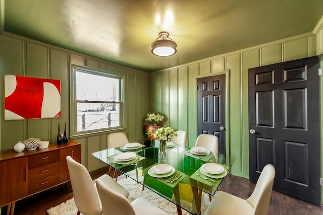 dining area featuring dark hardwood / wood-style flooring