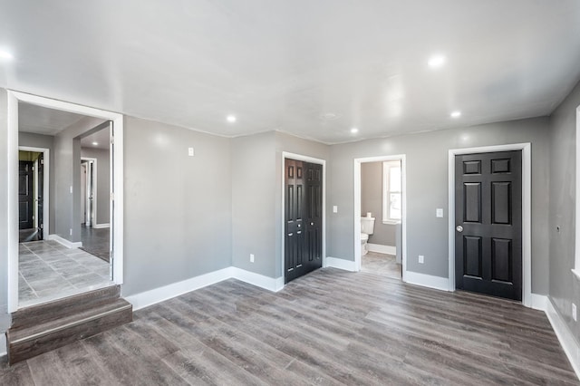 empty room with wood-type flooring