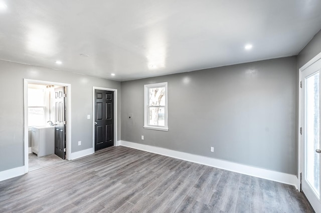 unfurnished bedroom with light wood-type flooring