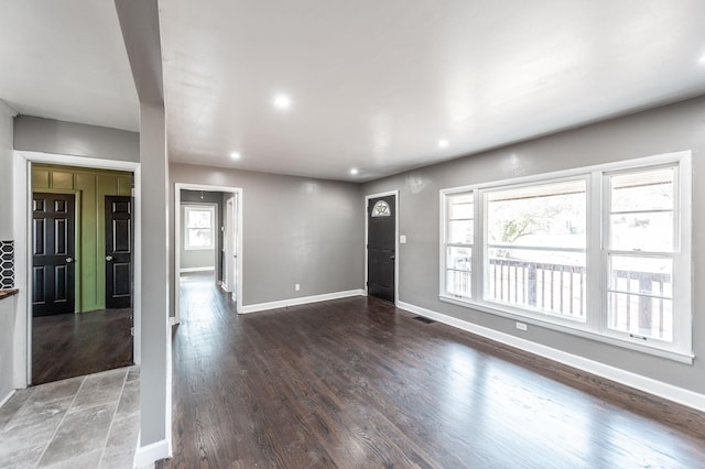 interior space with dark hardwood / wood-style flooring