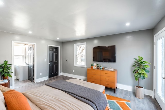 bedroom featuring hardwood / wood-style floors