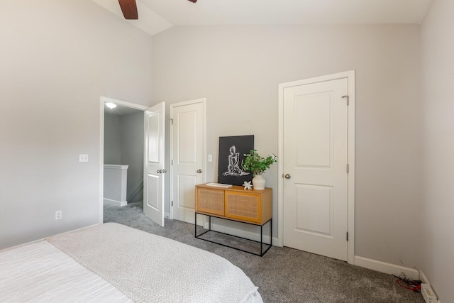 bedroom featuring vaulted ceiling, carpet, and ceiling fan