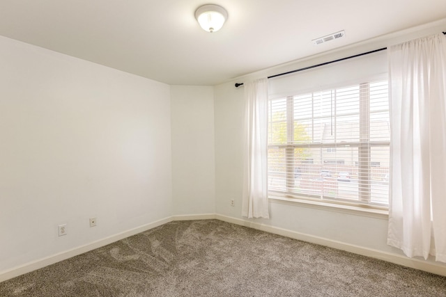 spare room with carpet flooring