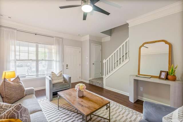 living room featuring crown molding, ceiling fan, and wood-type flooring