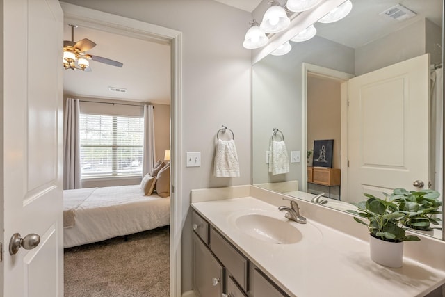 bathroom featuring ceiling fan and vanity