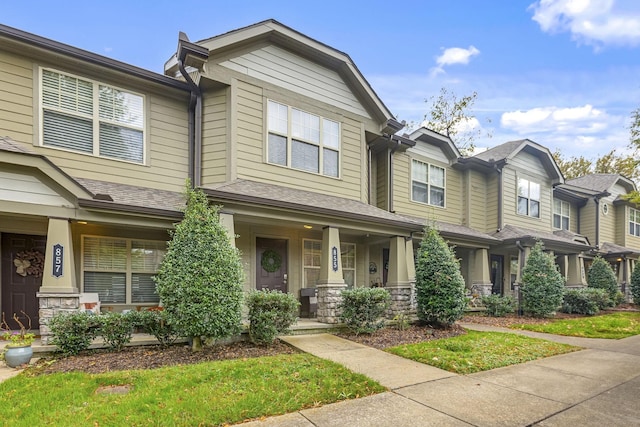 multi unit property featuring covered porch