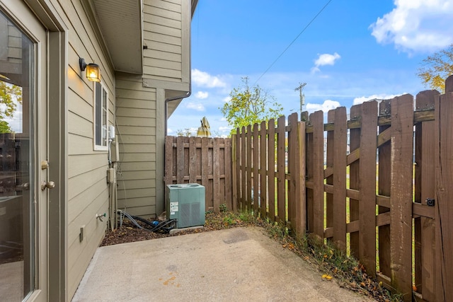 view of patio with central AC