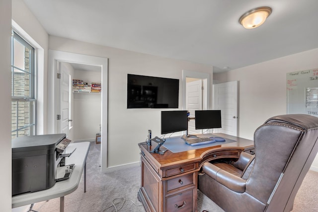 home office featuring light colored carpet