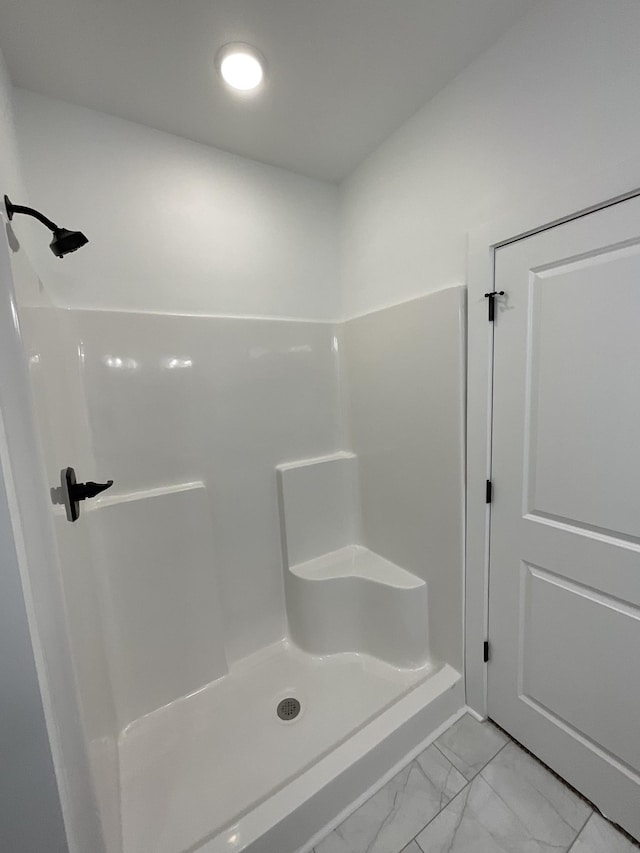 bathroom featuring a shower