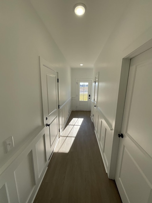 hall featuring dark wood-type flooring