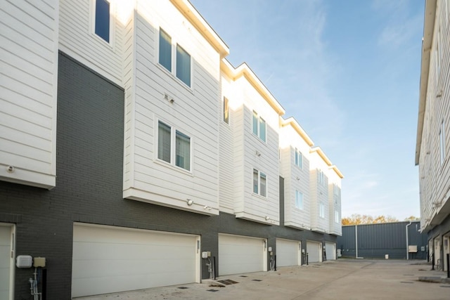 view of building exterior featuring a garage