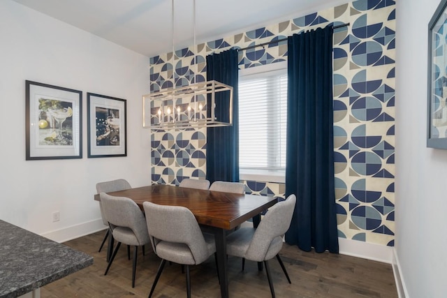 dining area with dark hardwood / wood-style floors