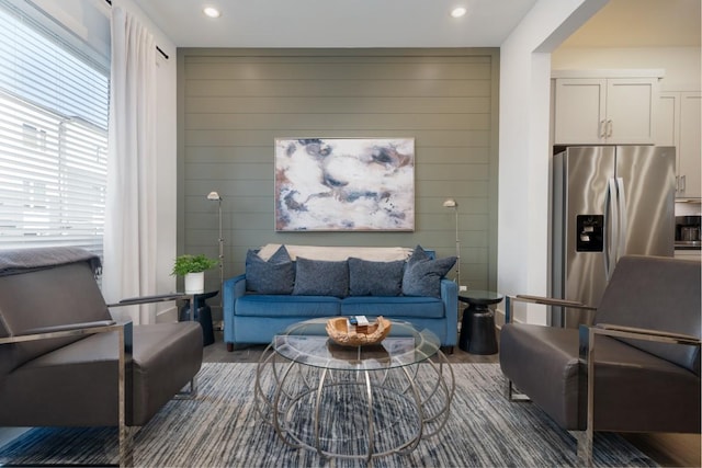 living room featuring dark wood-type flooring