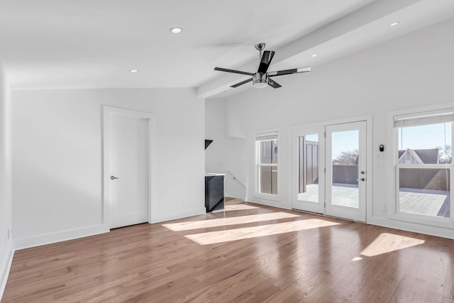 unfurnished living room featuring baseboards, light wood finished floors, lofted ceiling, recessed lighting, and ceiling fan