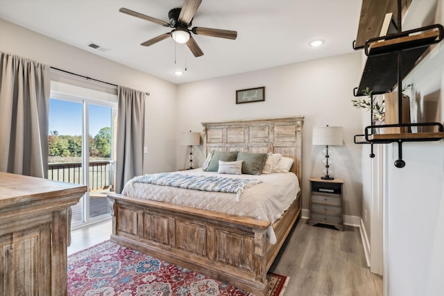 bedroom with access to exterior, ceiling fan, and light wood-type flooring