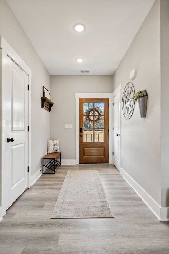 doorway featuring light hardwood / wood-style floors