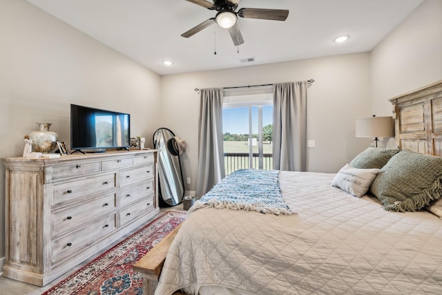 bedroom featuring ceiling fan and access to exterior