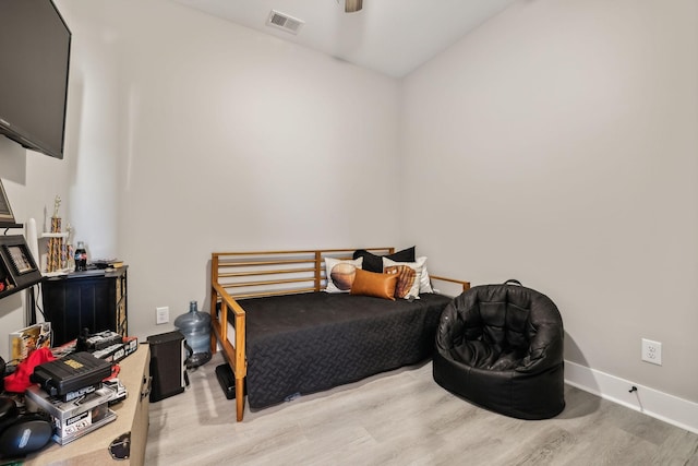 bedroom featuring light hardwood / wood-style floors