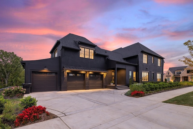 view of front of home with a garage