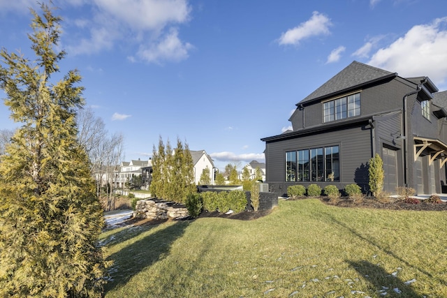 view of yard featuring a garage