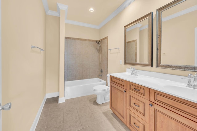 full bathroom with ornamental molding, vanity, tile patterned flooring, toilet, and tiled shower / bath