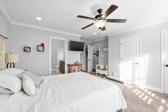 bedroom with ceiling fan, connected bathroom, and crown molding